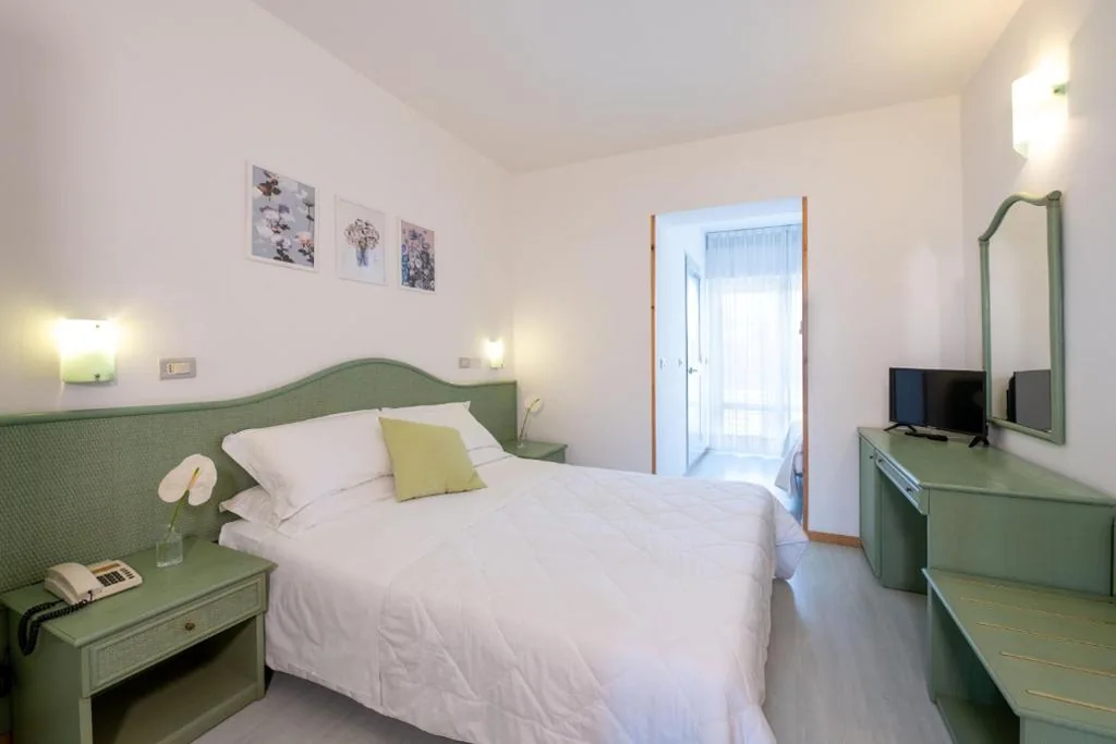 Triple Room — Hotel Capri