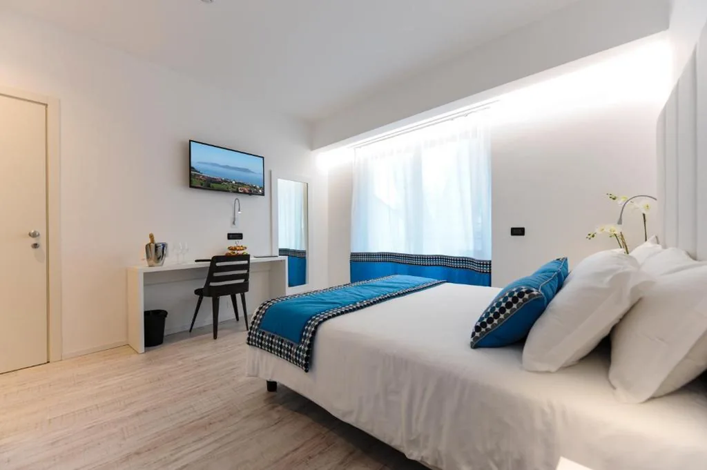 Standard Triple Room with Beach Access — Bellini Relais