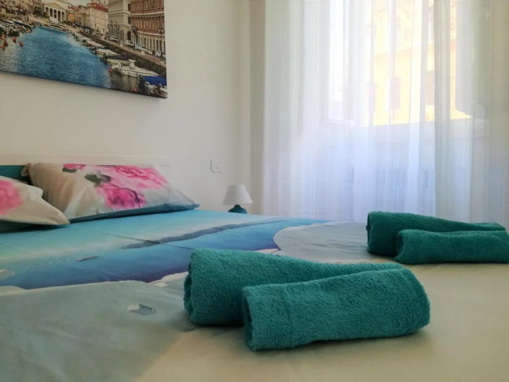Suite with Balcony — Trieste Center Rooms & Apartments – Fiori di Trieste