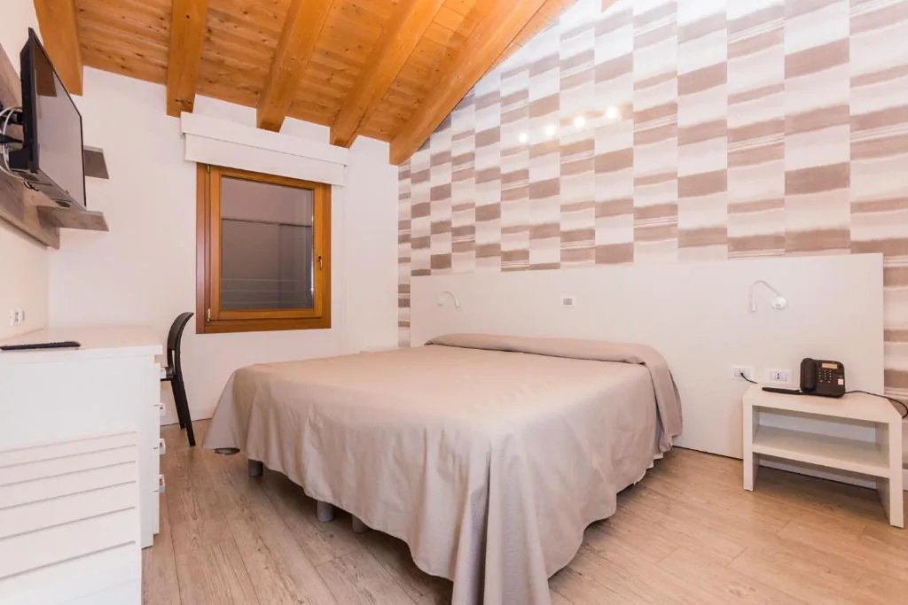Family Suite - Dependance 2 — Hotel Ristorante Cigno – Camere and Aparthotel