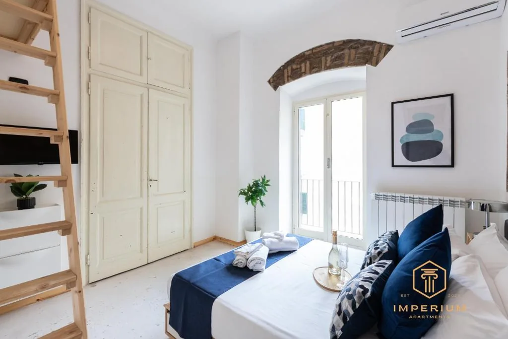 Imperium Vittorio Central Guesthouse – 4 BDR, City Center, 100mt to train station, pvt bathrooms, A-C — foto 5
