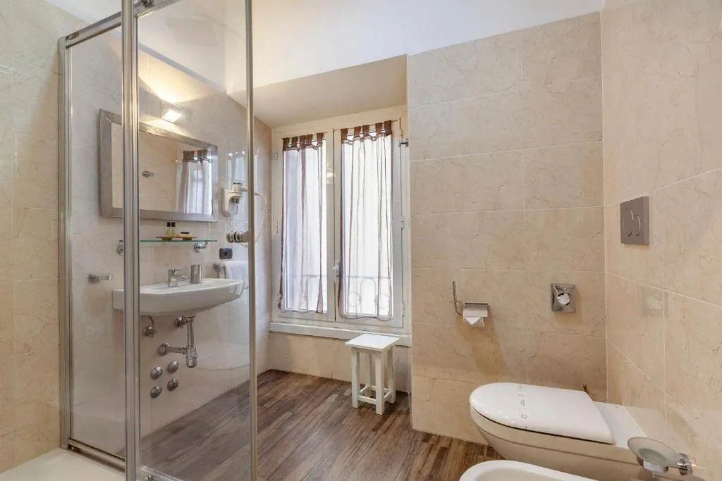 Inn Rome Rooms & Suites — foto 3