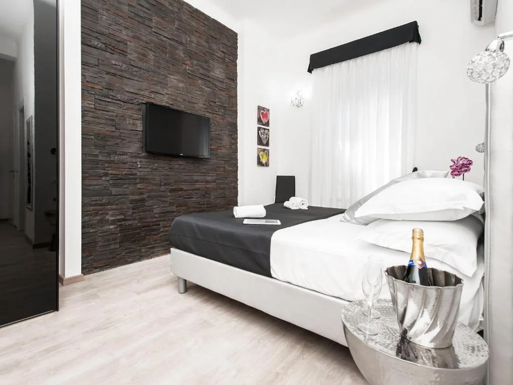 Junior Suite — Black Rooms Colosseo