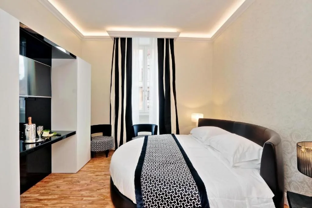 Junior Suite — BQ House FORI IMPERIALI Luxury Rooms