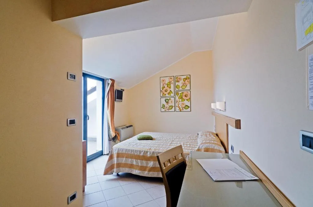Junior Suite con Balcone — Castellaro Golf Resort