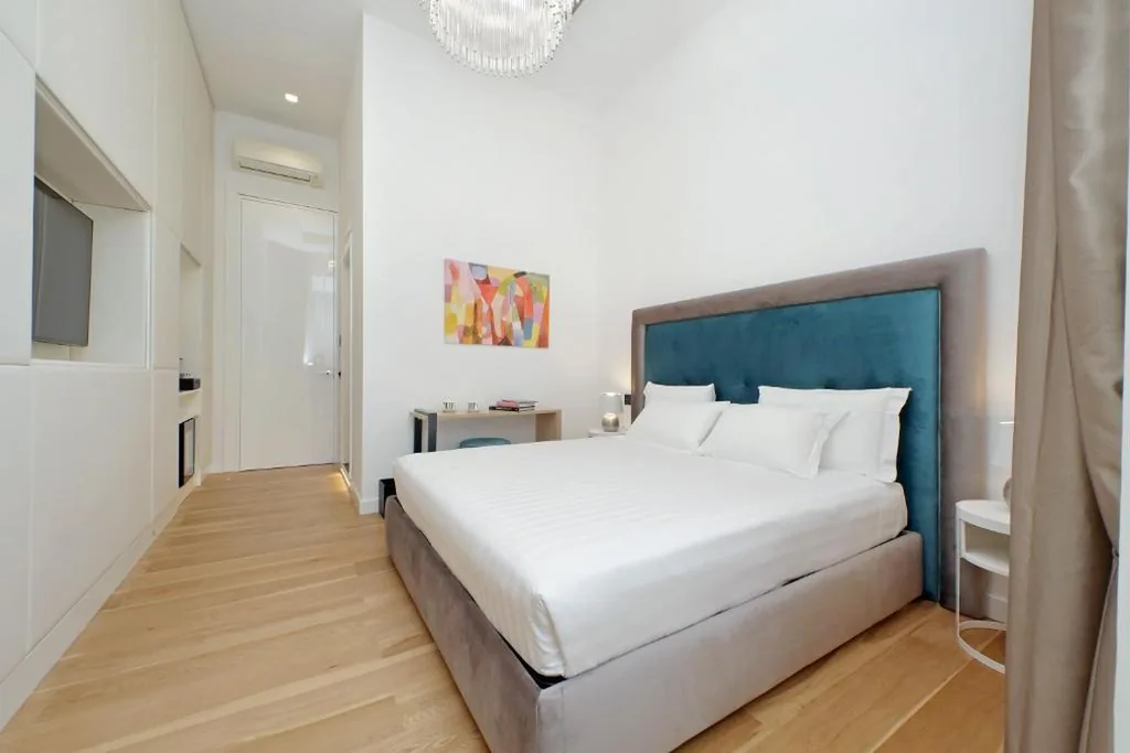 Junior Suite con Balcone — Domus Aurea Luxury Suites
