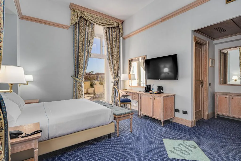 Junior Suite con Balcone — Hotel De La Ville