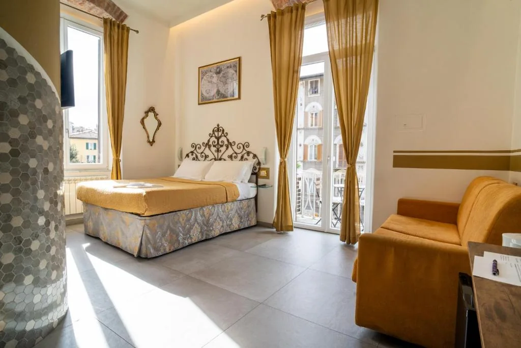 Junior Suite with Balcony — Teresa Rooms & Suites