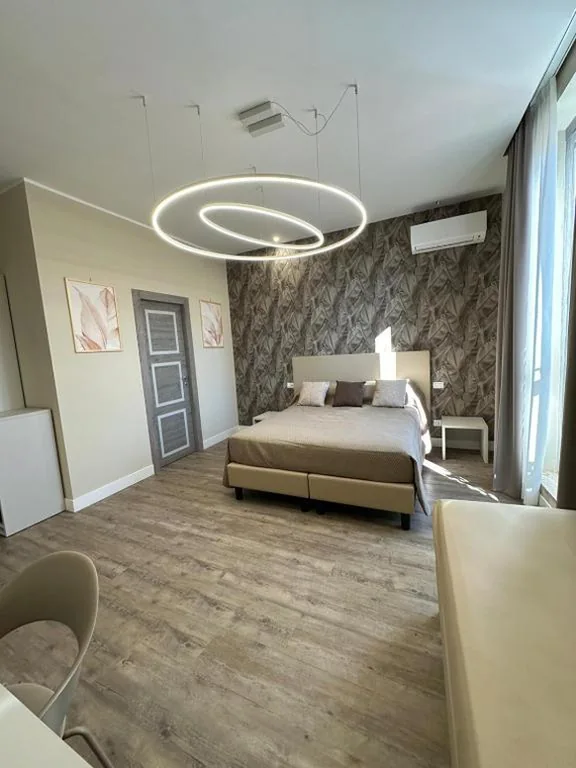 Junior Suite con Balcone — TrevInn Suites