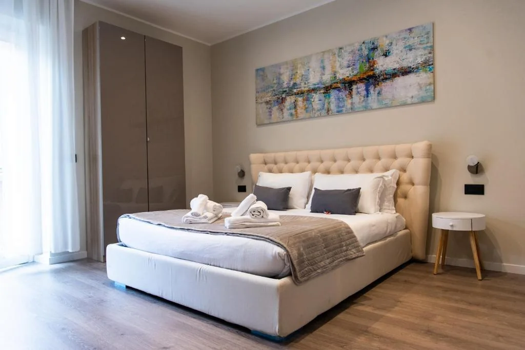 Junior Suite con Balcone — XXIV Domus Luxury Suites