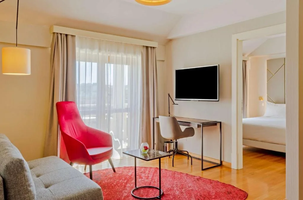 Junior Suite con Letto Supplementare (2 Adulti + 1 Bambino) — NH Collection Roma Giustiniano