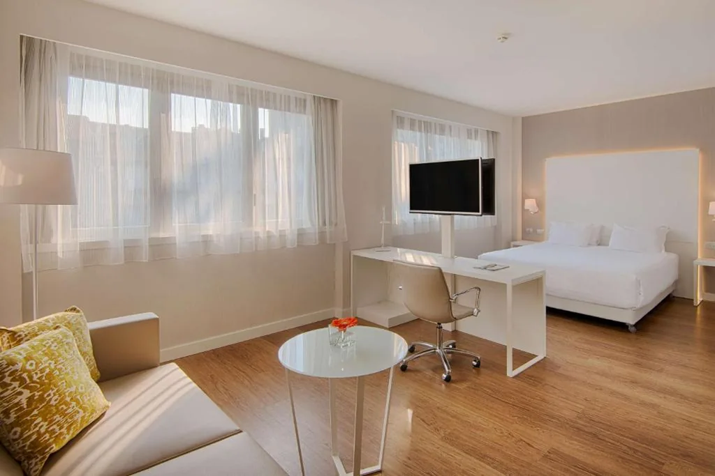 Junior Suite with Extra Bed (2 Adults + 2 Children) — NH Torino Centro