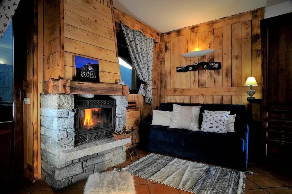 Junior Suite con Sauna — Aparthotel Foyer d’antan SUITE con caminetto hammam o vasca idromassaggio
