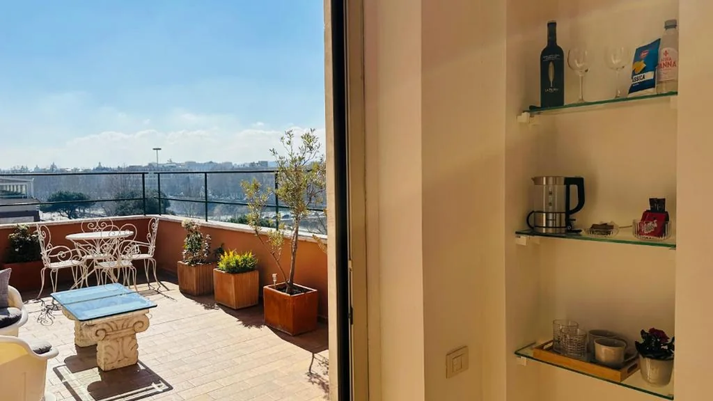 Junior Suite with Terrace — Terrazza Urania – Penthouse terrace with 360 view of Rome