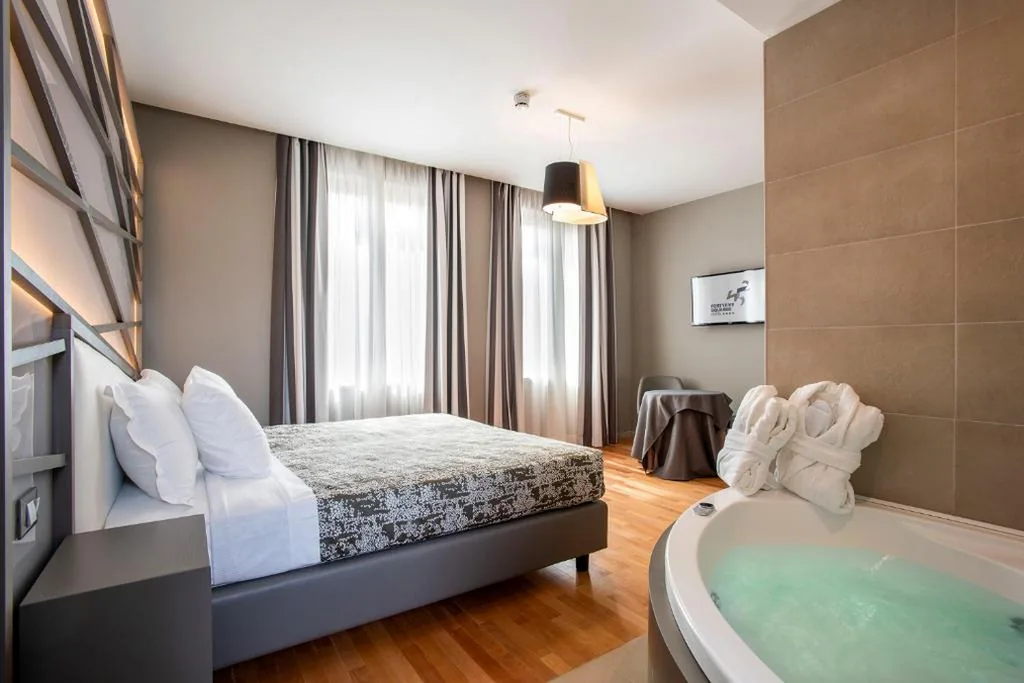 Junior Suite with Hot Tub — Fortyfive Squared Hotel