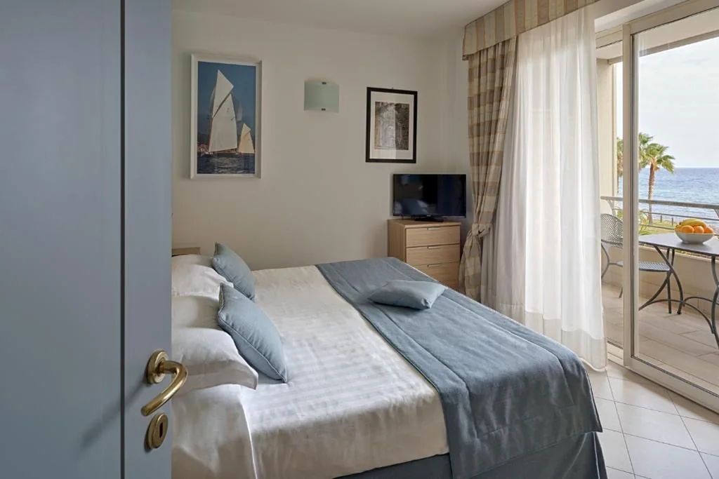 Junior Suite with Sea View — Aregai Marina Hotel & Residence