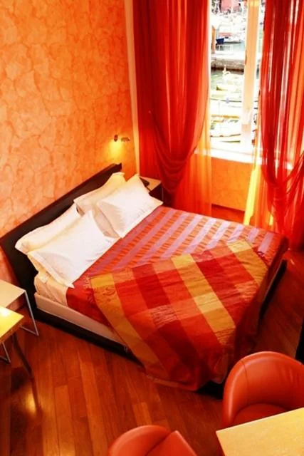 Junior Suite with Sea View — I Tre Merli Locanda