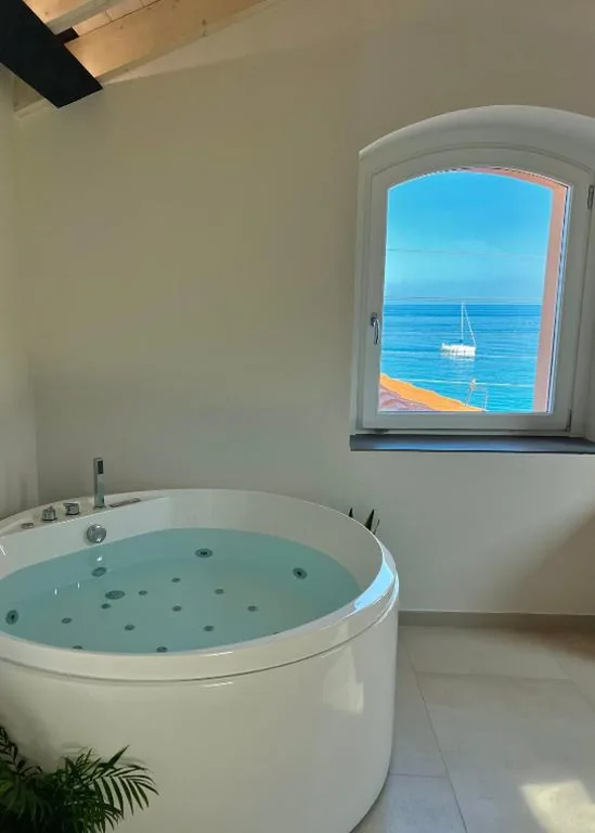 Junior Suite with Sea View — Oasi di Mare – Guest House