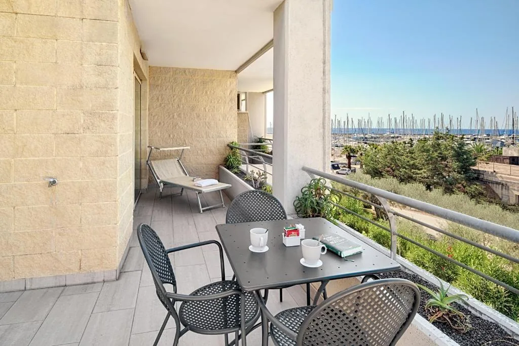 Junior Suite with Partial Sea View — Aregai Marina Hotel & Residence