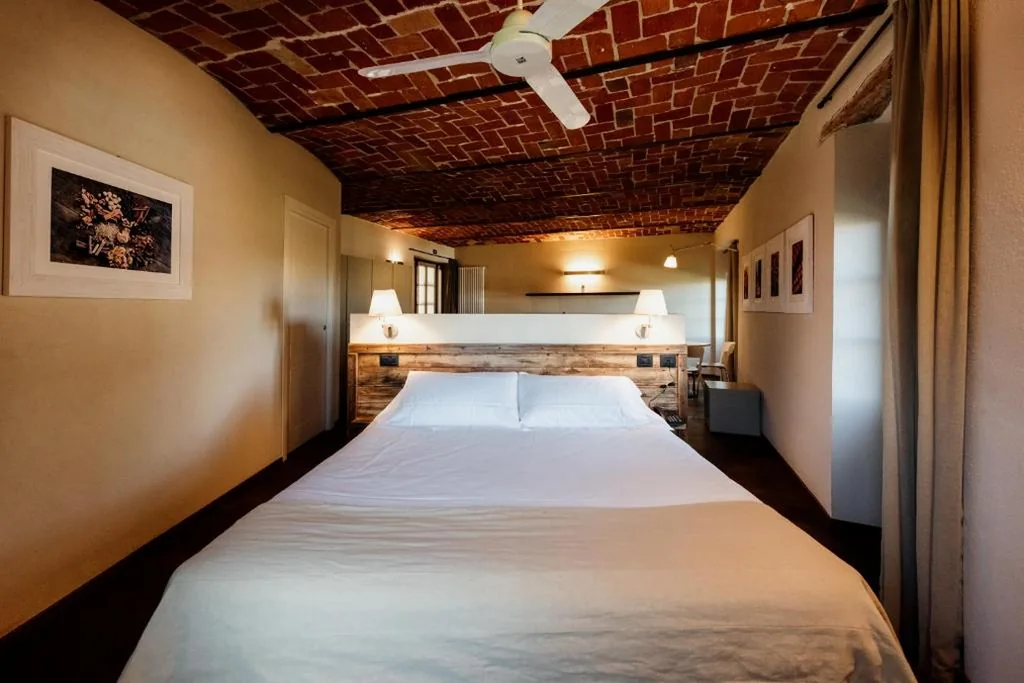 Junior Suite con Vista Piscina — I Tre Poggi Dimora di Charme