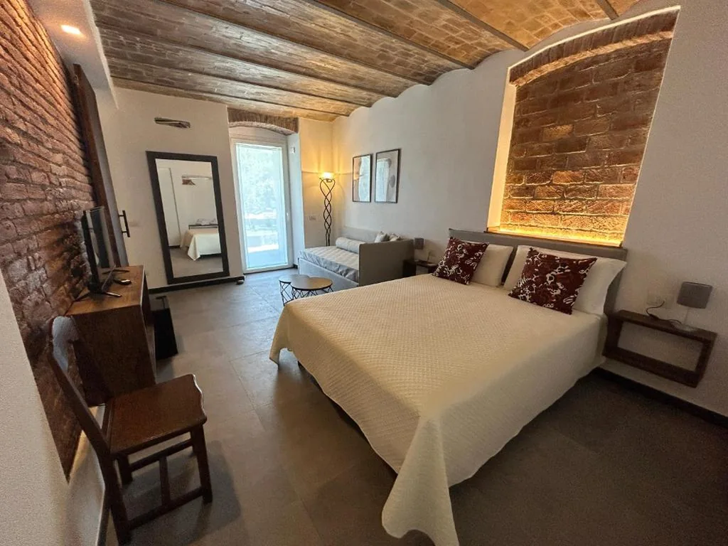 Junior Suite con Vista Piscina — Il Canneto