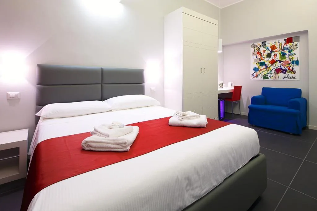 Deluxe Junior Suite — NearHome Smart Suites Guest House