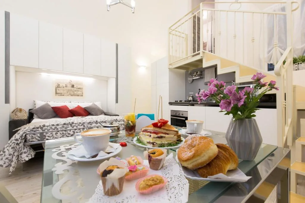 Junior Suite Executive Piano Terra — Navona Open Space Apartments