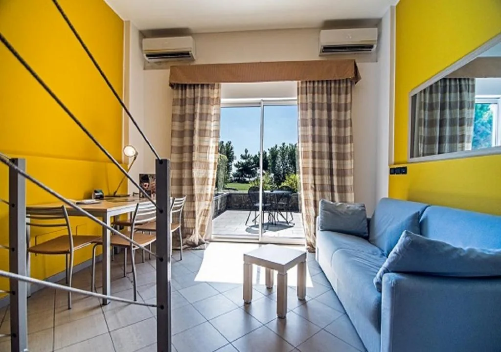 Split-Level Junior Suite with Partial Sea View — Aregai Marina Hotel & Residence