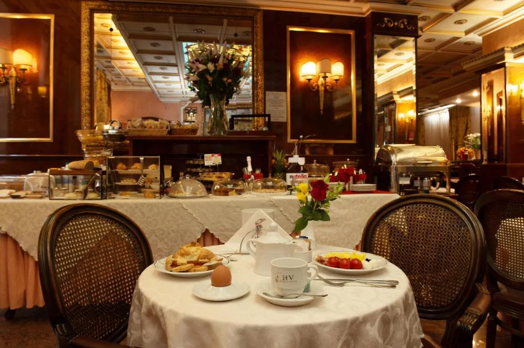 2 Camere Comunicanti — Hotel Vittoria