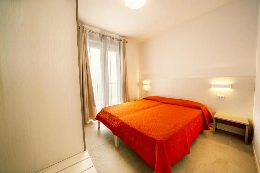 Two-Bedroom Apartment (6 Adults) — Hotel Residence La Rotonda