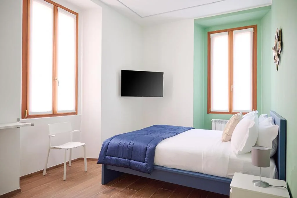 Deluxe Room (2 Adults + 1 Child) — Milan Retreats Porta Venezia Suites