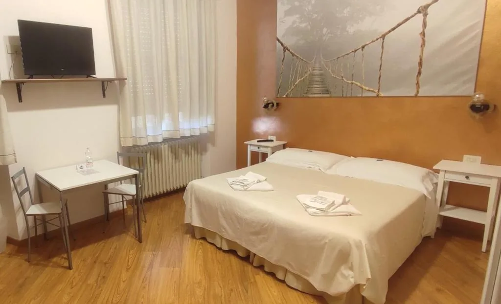 Camera Deluxe Matrimoniale/Doppia con Letti Singoli — Il Girasole High Quality Inn
