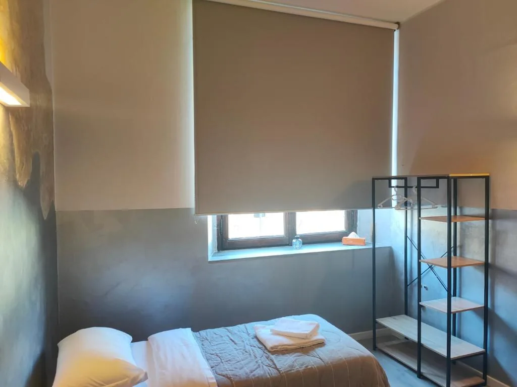 Double Room with Twin Beds and External Private Bathroom — Apartment Nido Stazione
