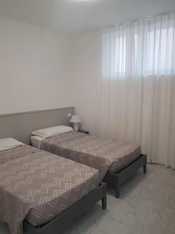 Twin Room with Private Bathroom — HOTEL LORENA