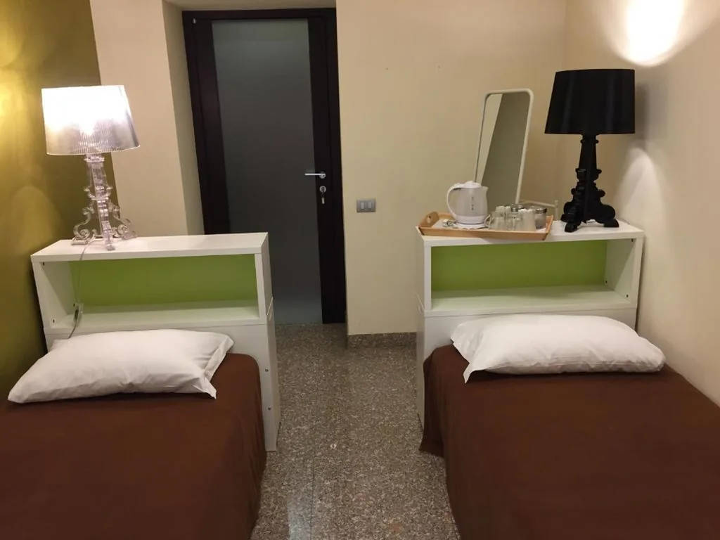 Twin Room with Shared Bathroom — Bergamo Center Rooms