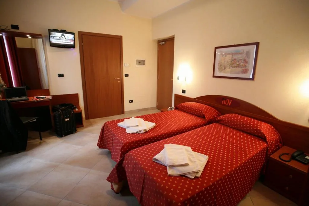 Twin Room — Hotel Della Volta