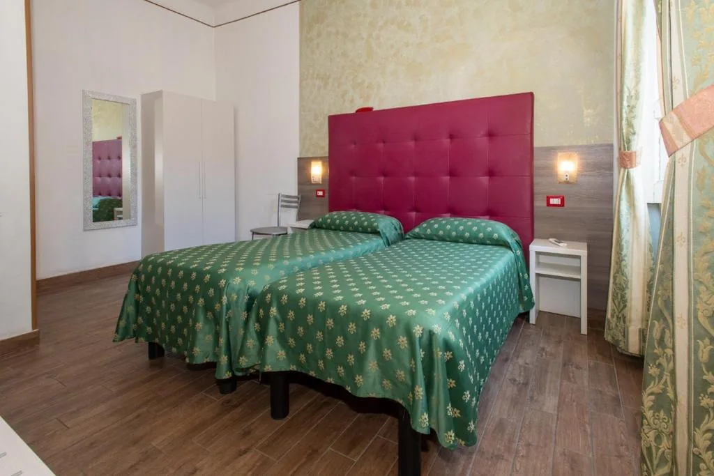 Twin Room — Hotel Piola