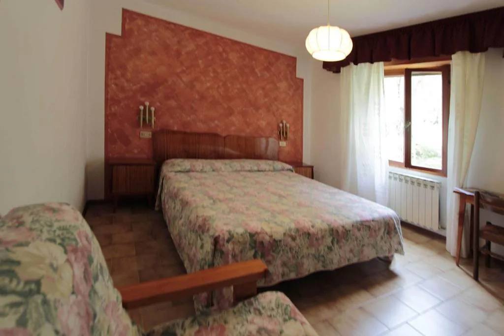 Camera Economy Matrimoniale/Doppia con Letti Singoli — Hotel Augusta Garnì