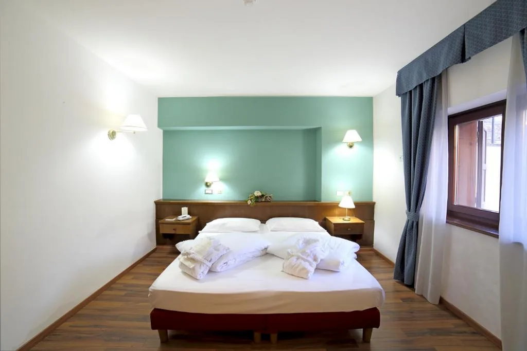 Camera Economy Matrimoniale/Doppia con Letti Singoli — Hotel Baita Clementi