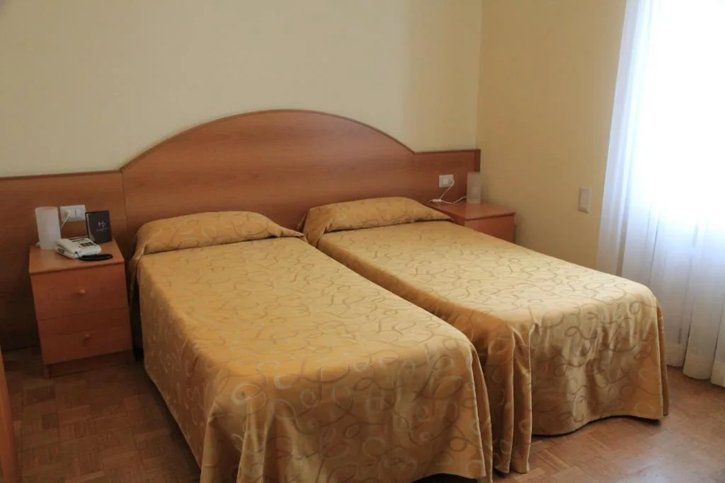 Camera Economy Matrimoniale/Doppia con Letti Singoli — Hotel Palladio