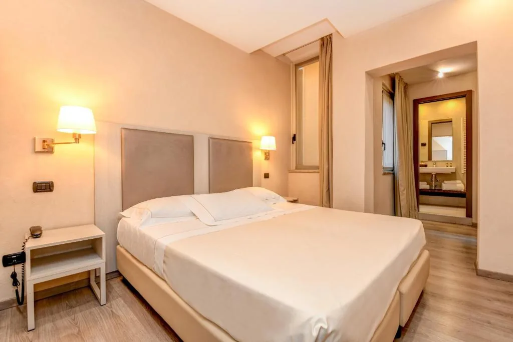 Camera Economy Matrimoniale/Doppia con Letti Singoli — Hotel Tripoli
