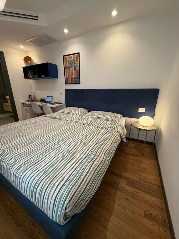 Economy Double/Twin Room — Tirano stazioni flow rooms