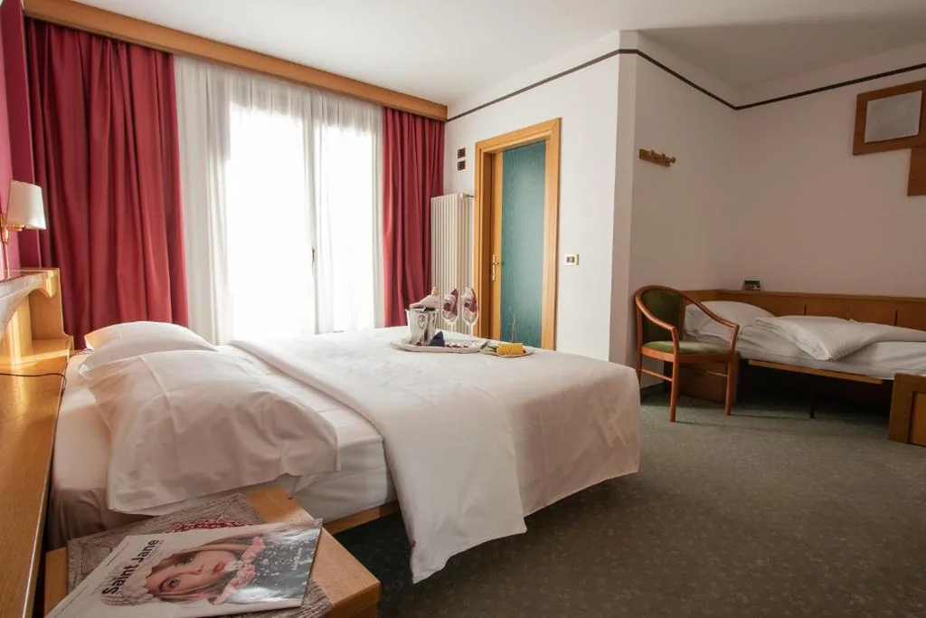 Camera Familiare (2 Adulti + 1 Bambino) — Hotel Santanton