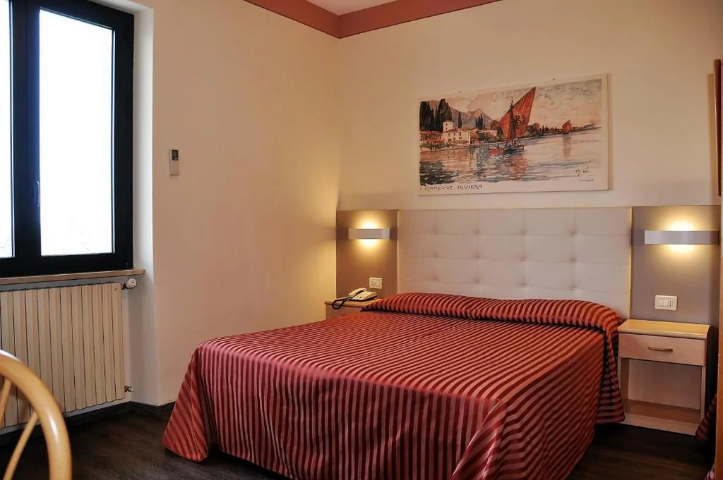 Family Room (2 Adults + 2 Children) — Hotel Panoramica
