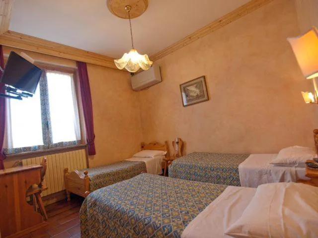 Family Room (2 Adults + 2 Children) — Hotel Stelvio