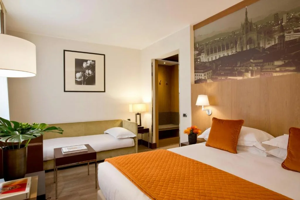 Family Room (2 Adults + 2 Children) — Starhotels Ritz