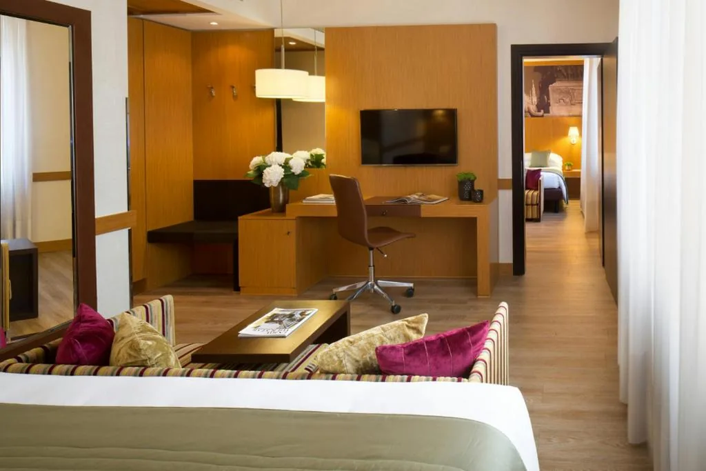 Family Room (2 Adults + 2 Children) — Starhotels Tourist
