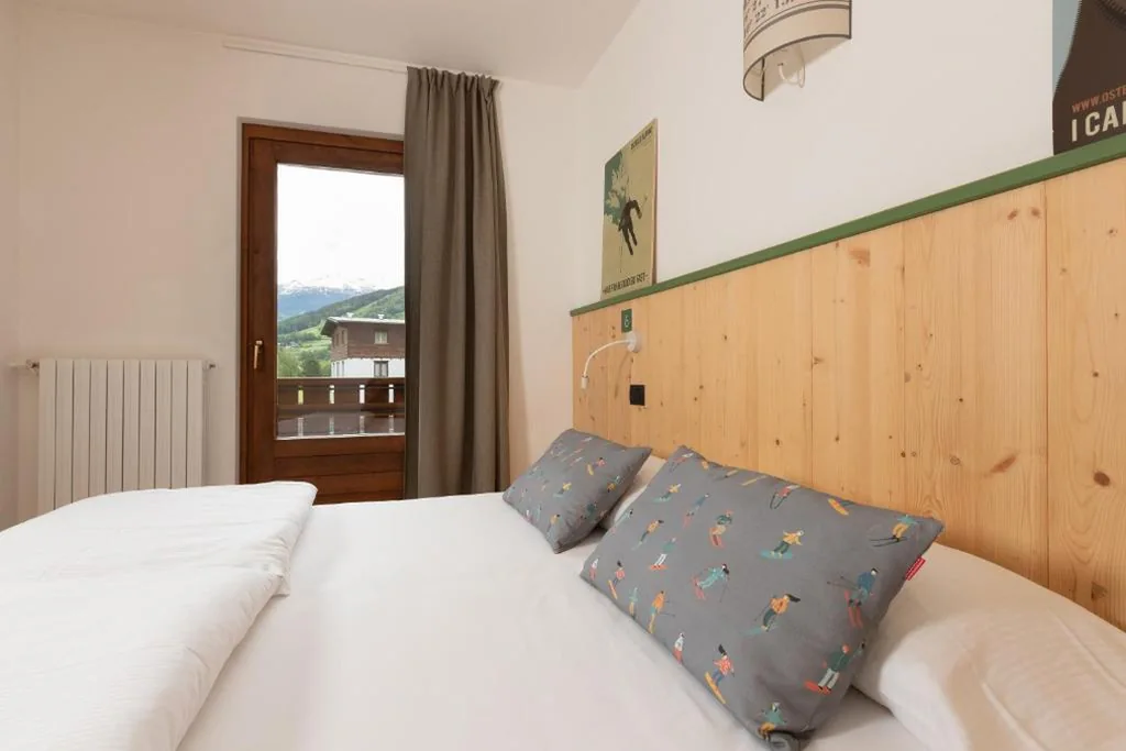 Family Room with Private Bathroom — Ostello Alpino