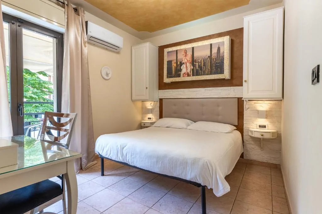 Family Room with Balcony — Hotel Central Giacomini