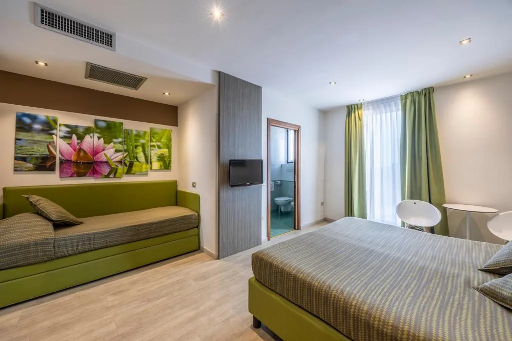 Camera Familiare con Terrazza — Hotel Ideal